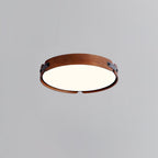 Natural wood ceiling light mounted flush against the ceiling