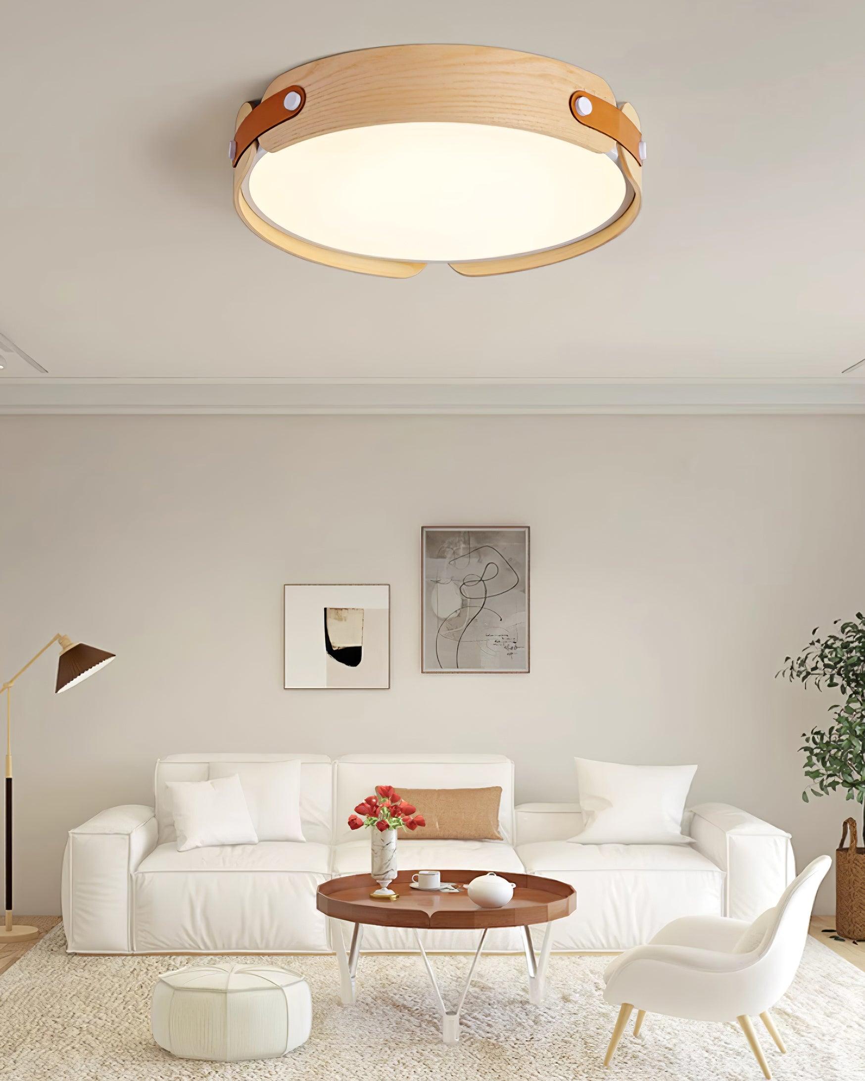 Wood-tone flush ceiling light glowing overhead