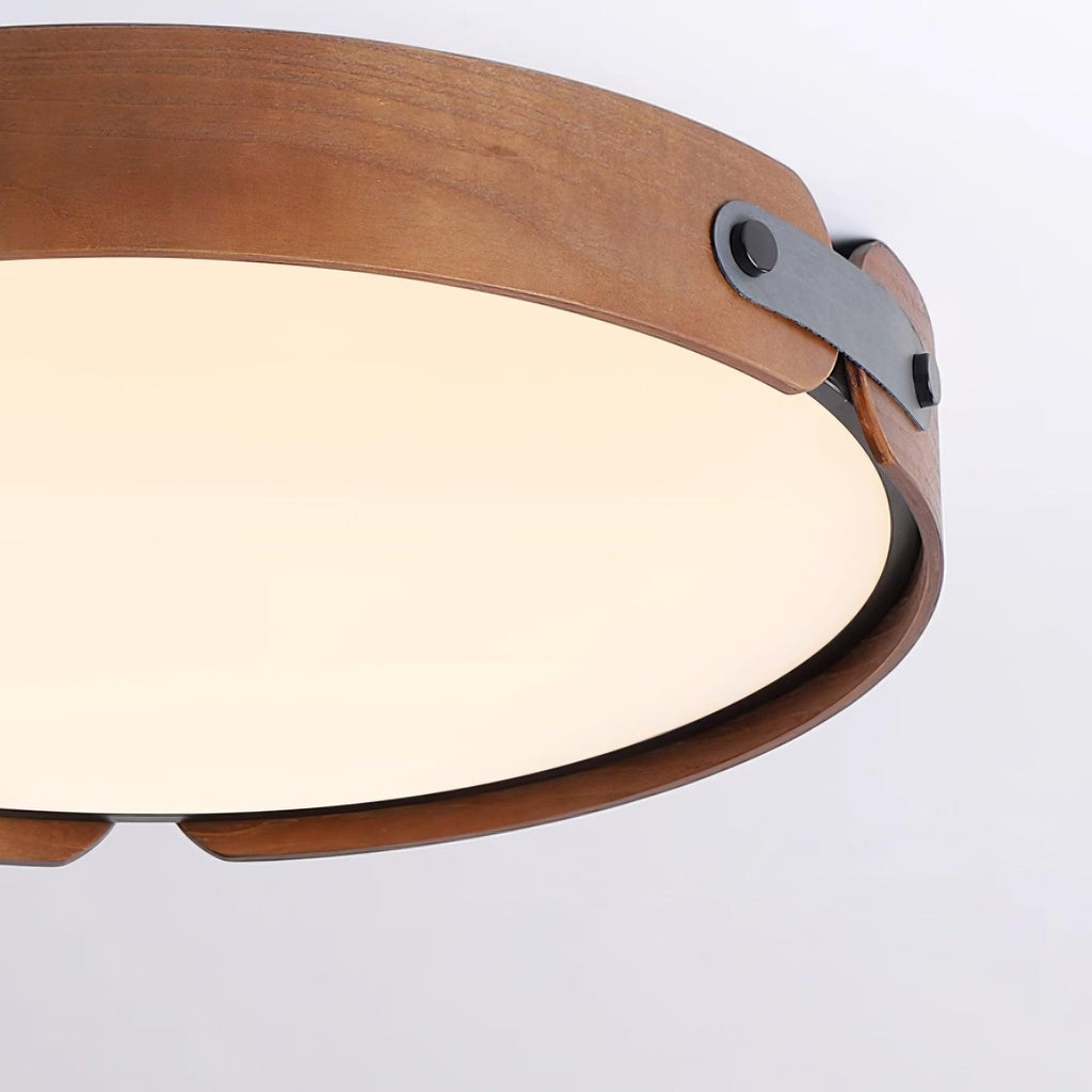 Slim wood-tone ceiling light against a pale ceiling