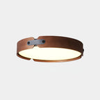 Round wooden ceiling light close detail of the rim