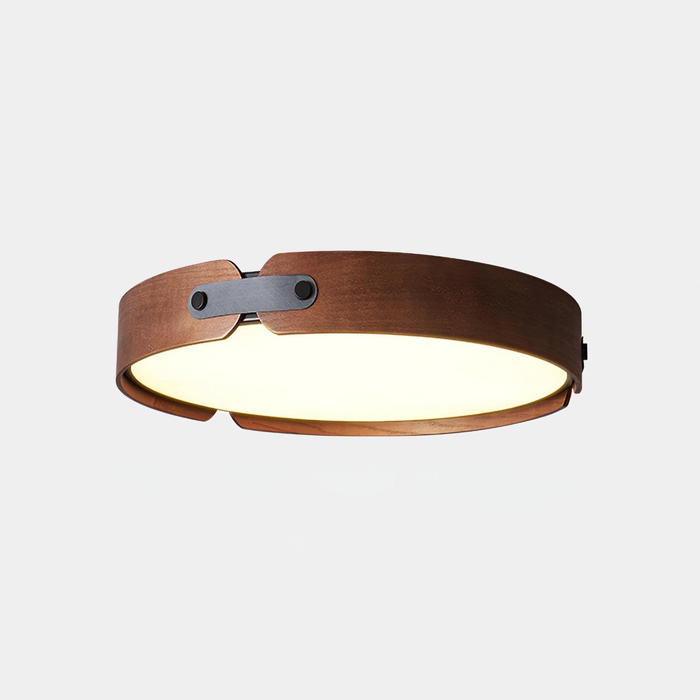 Round wooden ceiling light close detail of the rim