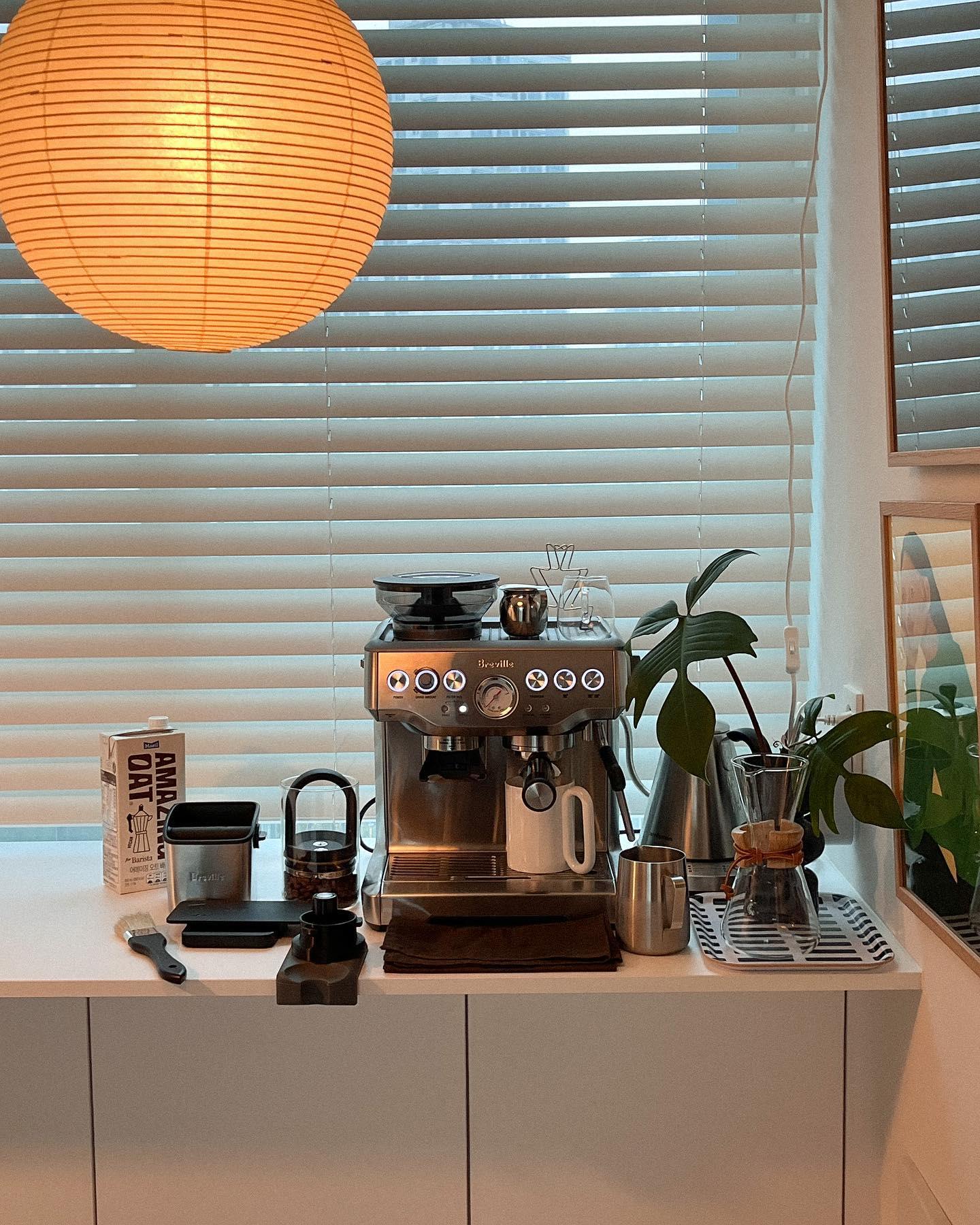 Mulberry paper globe pendant light in a styled interior
