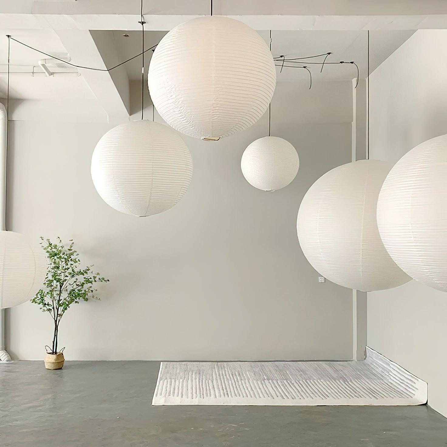 Mulberry paper pendant light hanging in a bright room