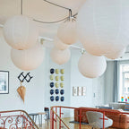 Mulberry paper globe pendant light over a styled space