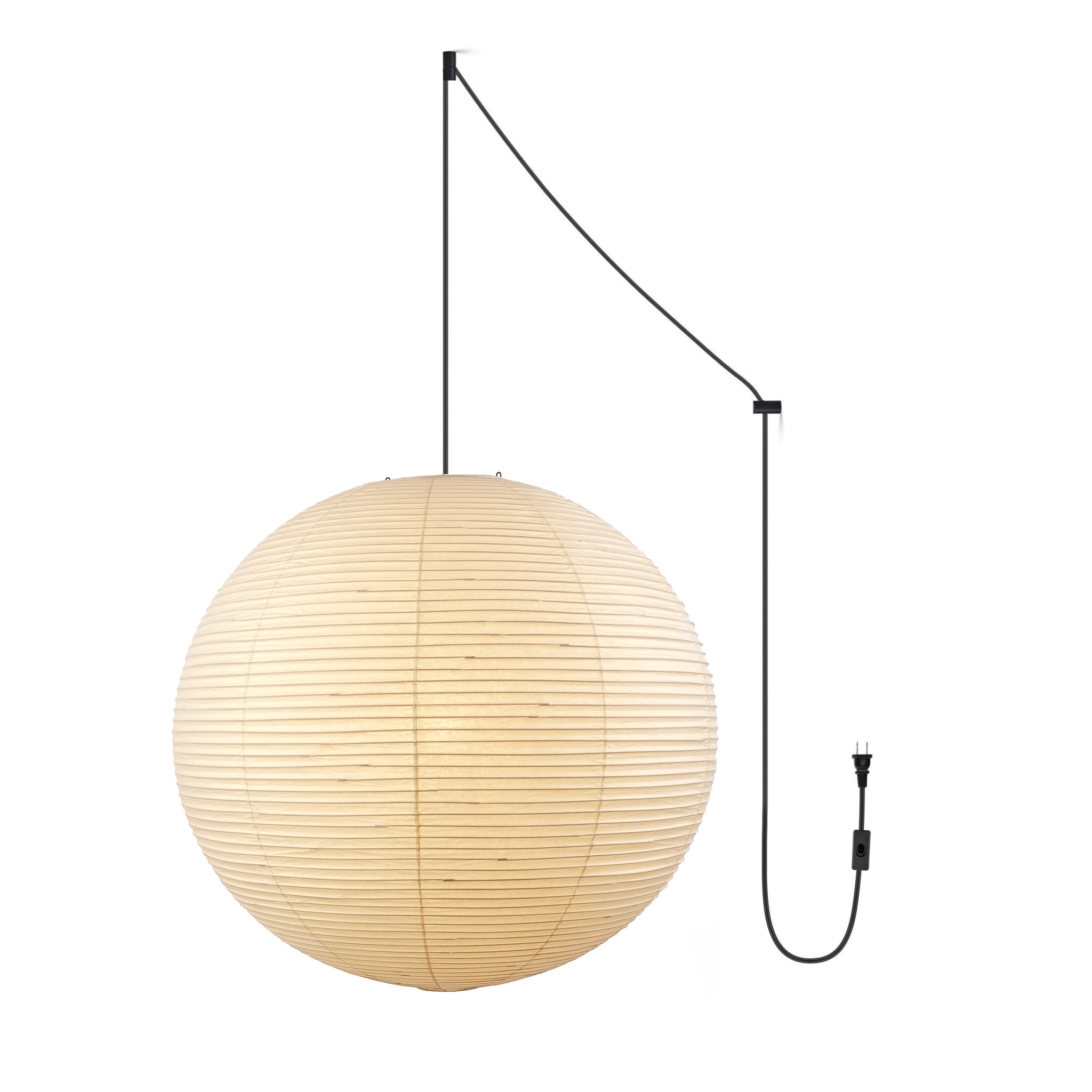 Mulberry paper globe pendant light glowing in an interior