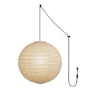 White paper globe pendant light hanging from a black swag cord