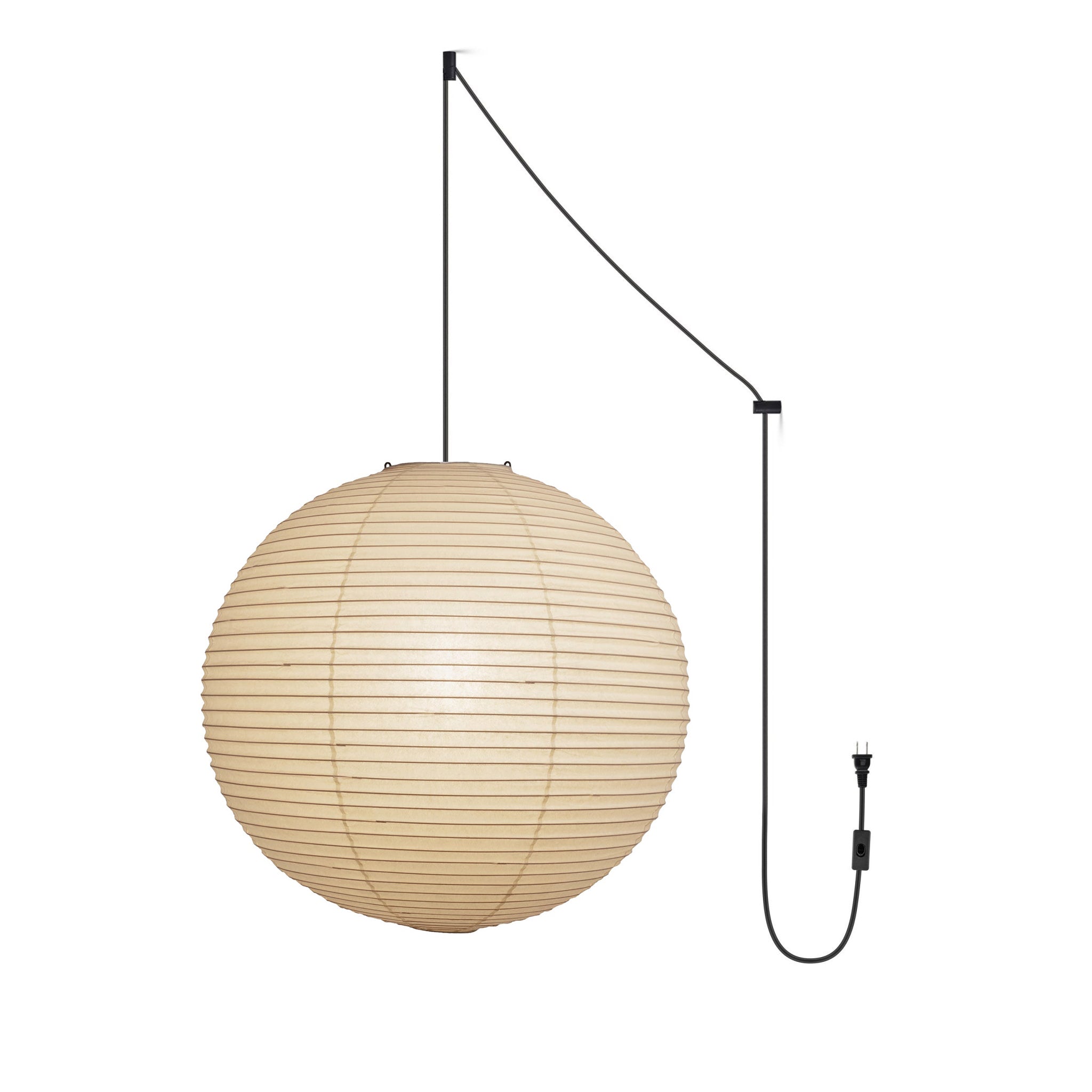 White paper globe pendant light hanging from a black swag cord