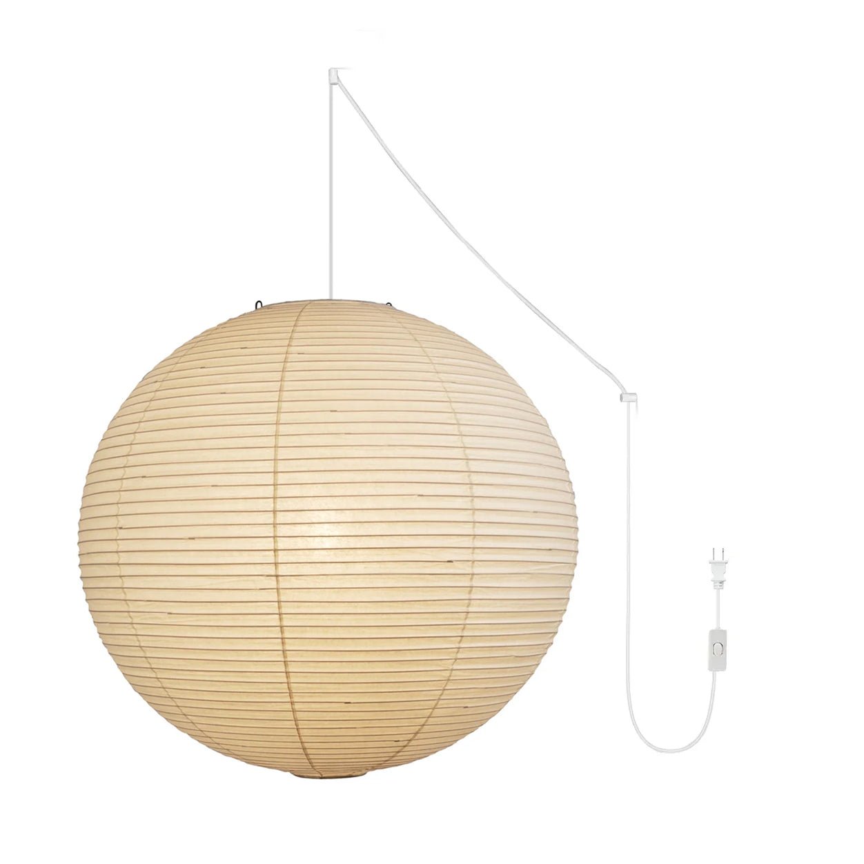 Round mulberry paper pendant light glowing in an interior