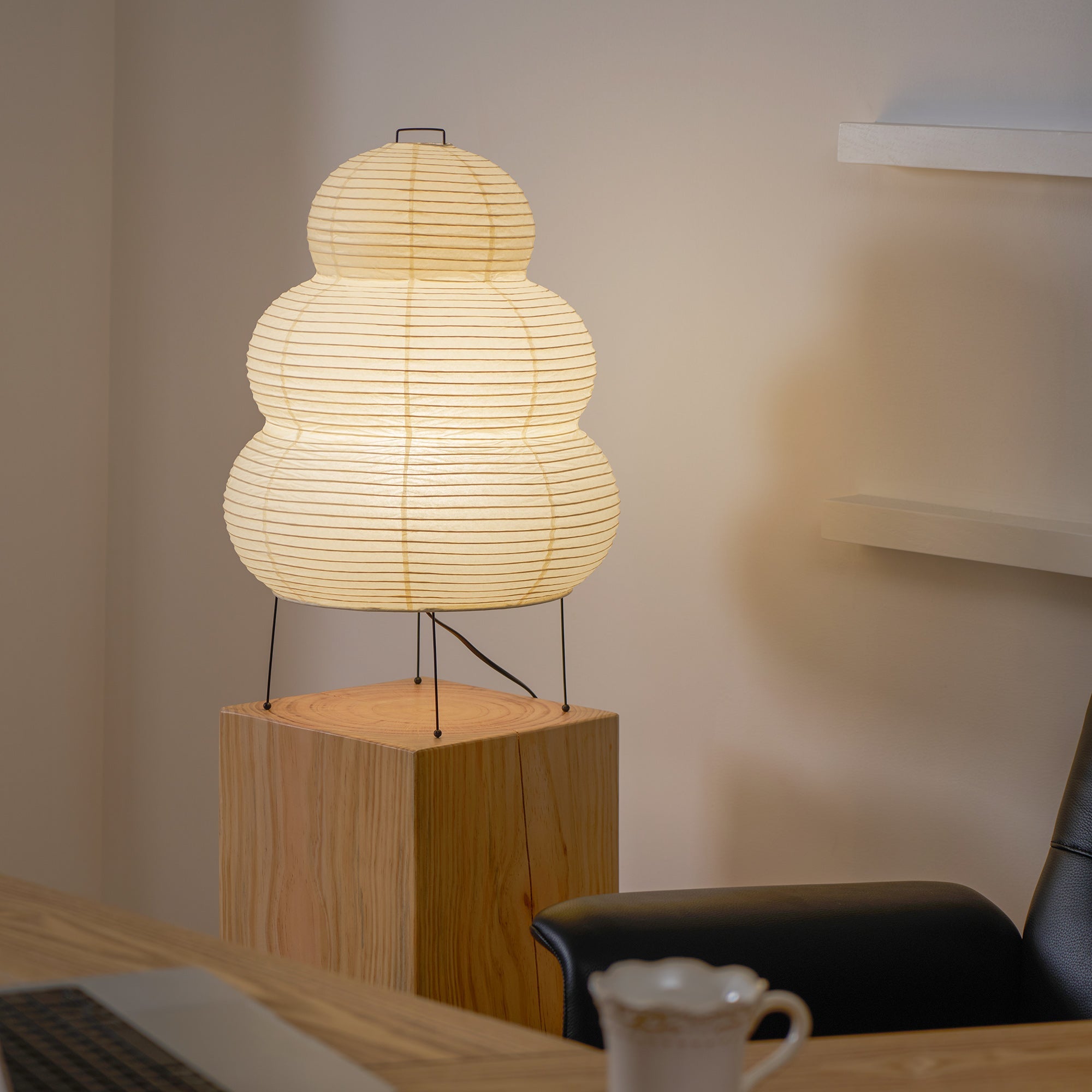 White mulberry paper table lamp lighting a peaceful corner