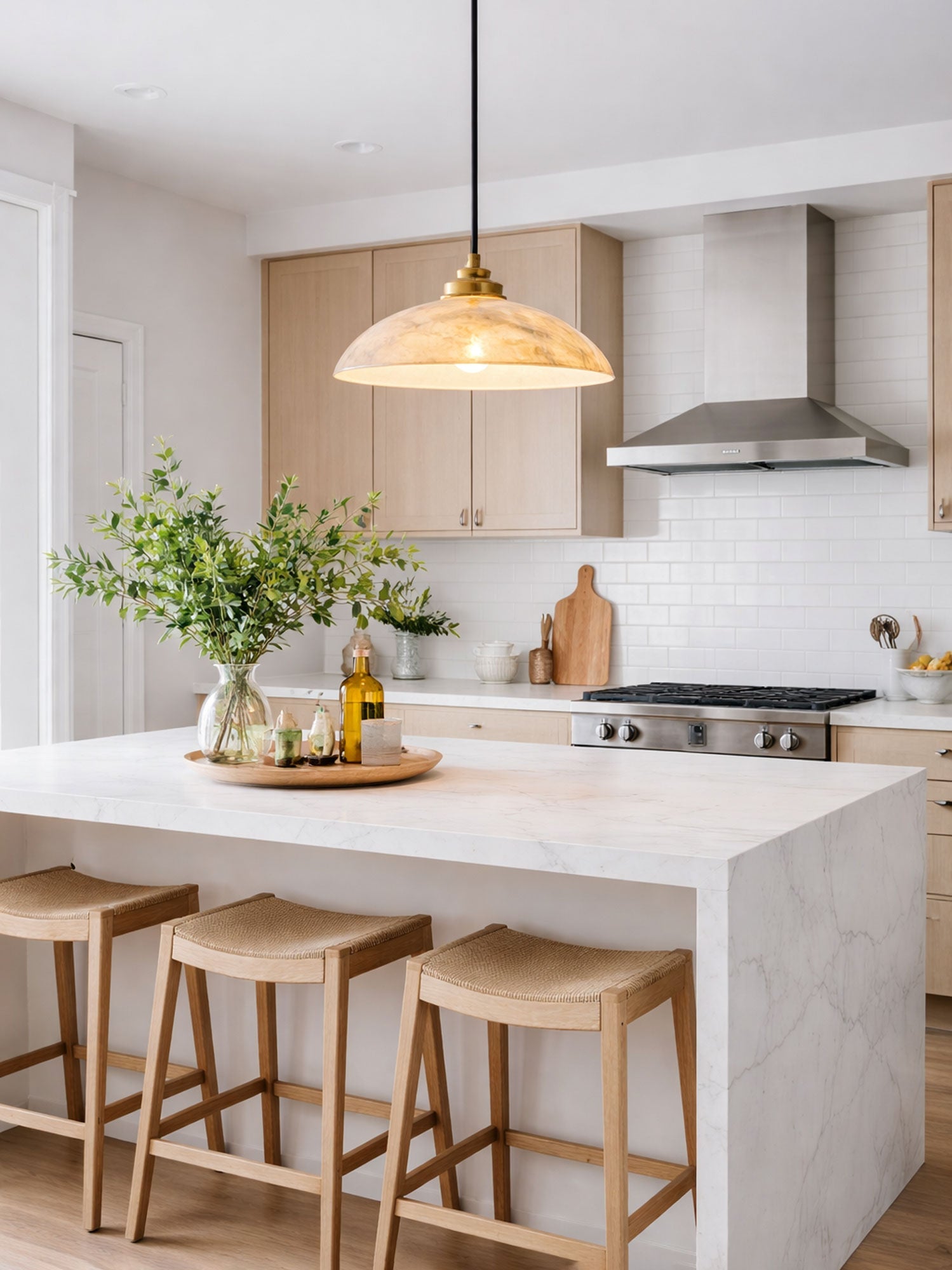 Slim alabaster dome pendant light with brass fitting and cable