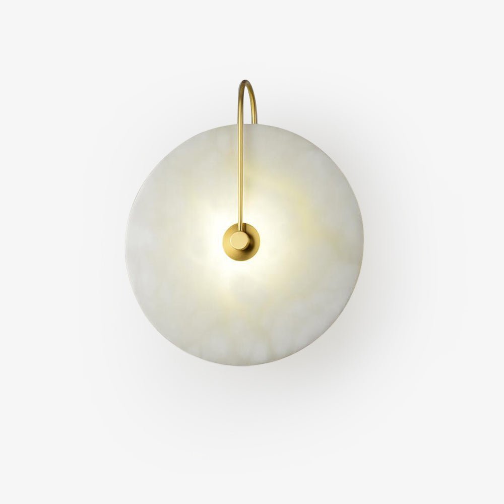 Lit gold Elaris wall light on a plain white background, the disc mottled with natural stone pattern.