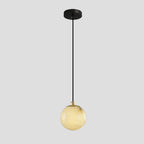 Single alabaster ball of the Afralia cluster chandelier on its black cord and brass cap.