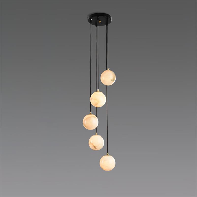 The five-ball Afralia alabaster chandelier, spheres stepping down in a loose spiral.