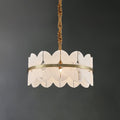 Single-tier cloudscape chandelier on dark grey, scalloped alabaster panels held by a brass ring.