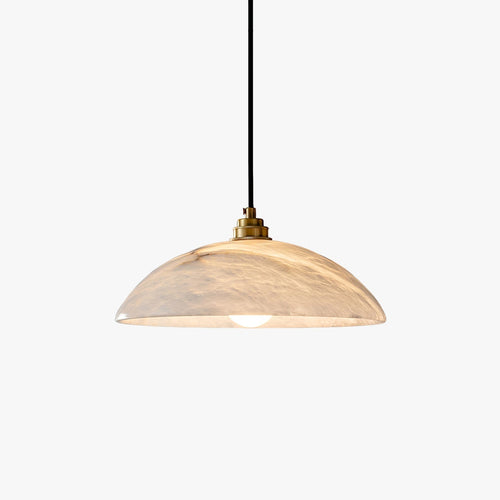 Cropped view of the alabaster dome pendant showing the brass socket collar above the lit shade.