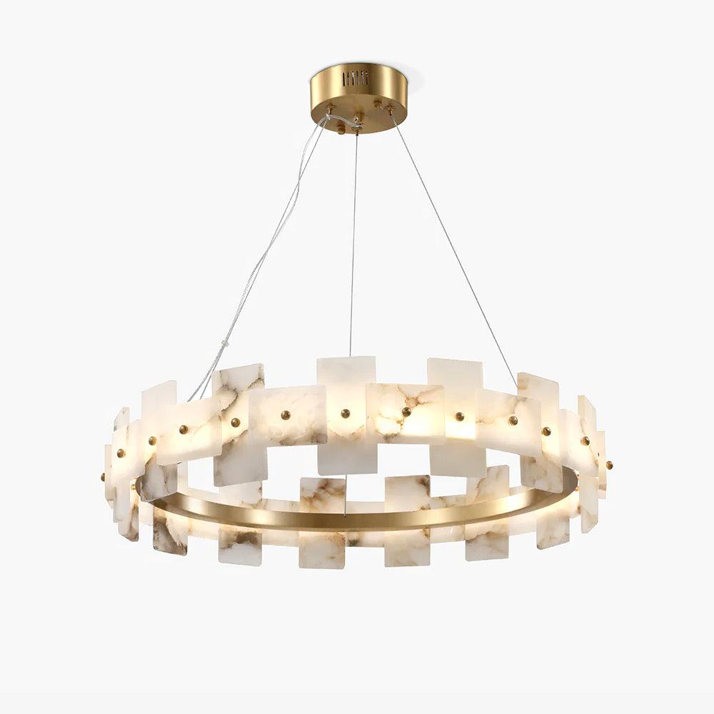 A larger ring on white, more alabaster tiles crowding the brass circle, lit from within.