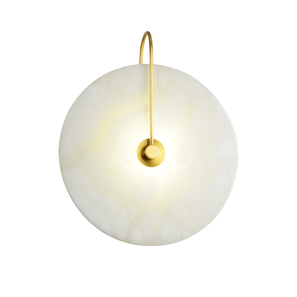 Cut-out product image of the lit gold Elaris wall light on a plain white background.