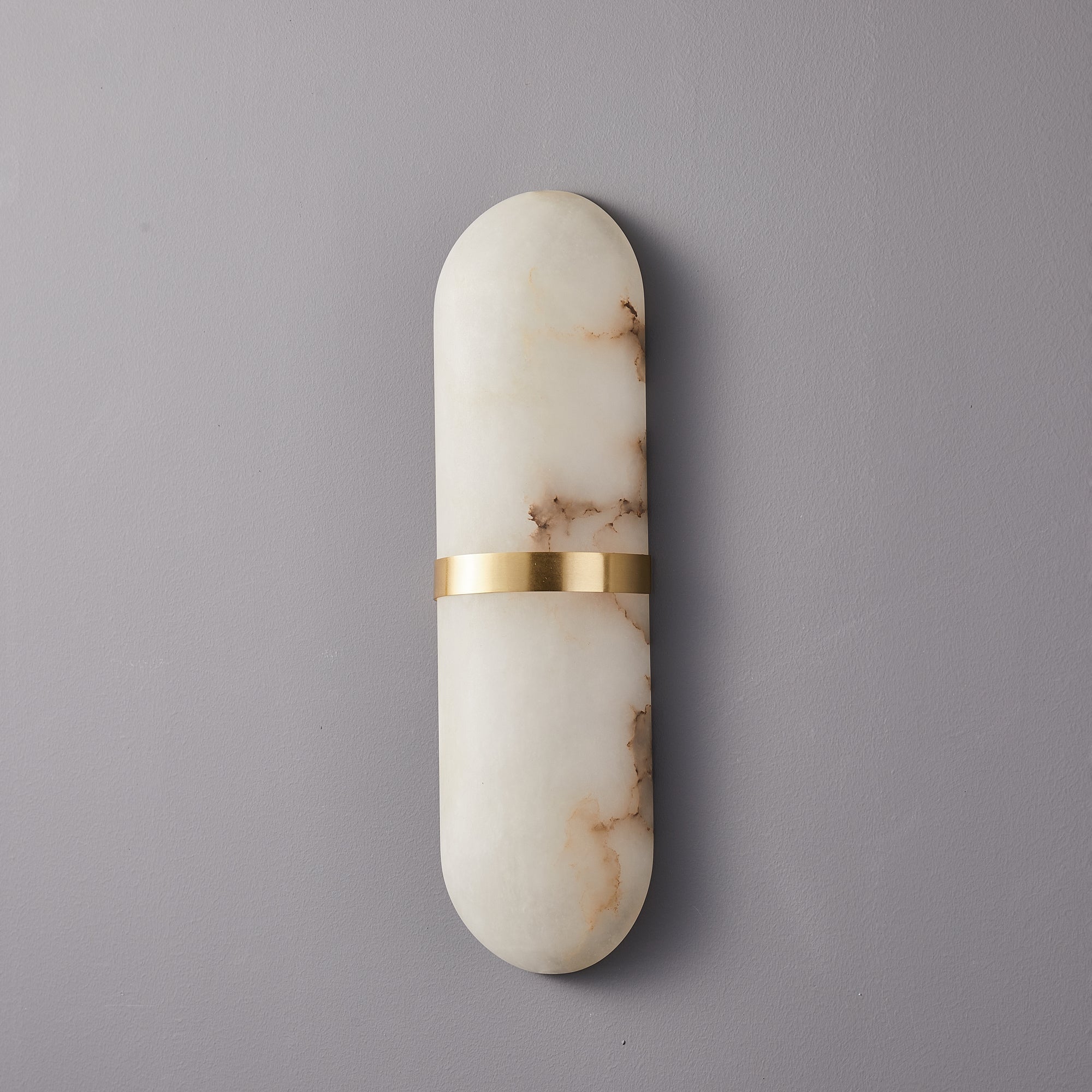 Clérachic unlit close view of the brass-banded alabaster shade, showing rust and grey veining in the stone
