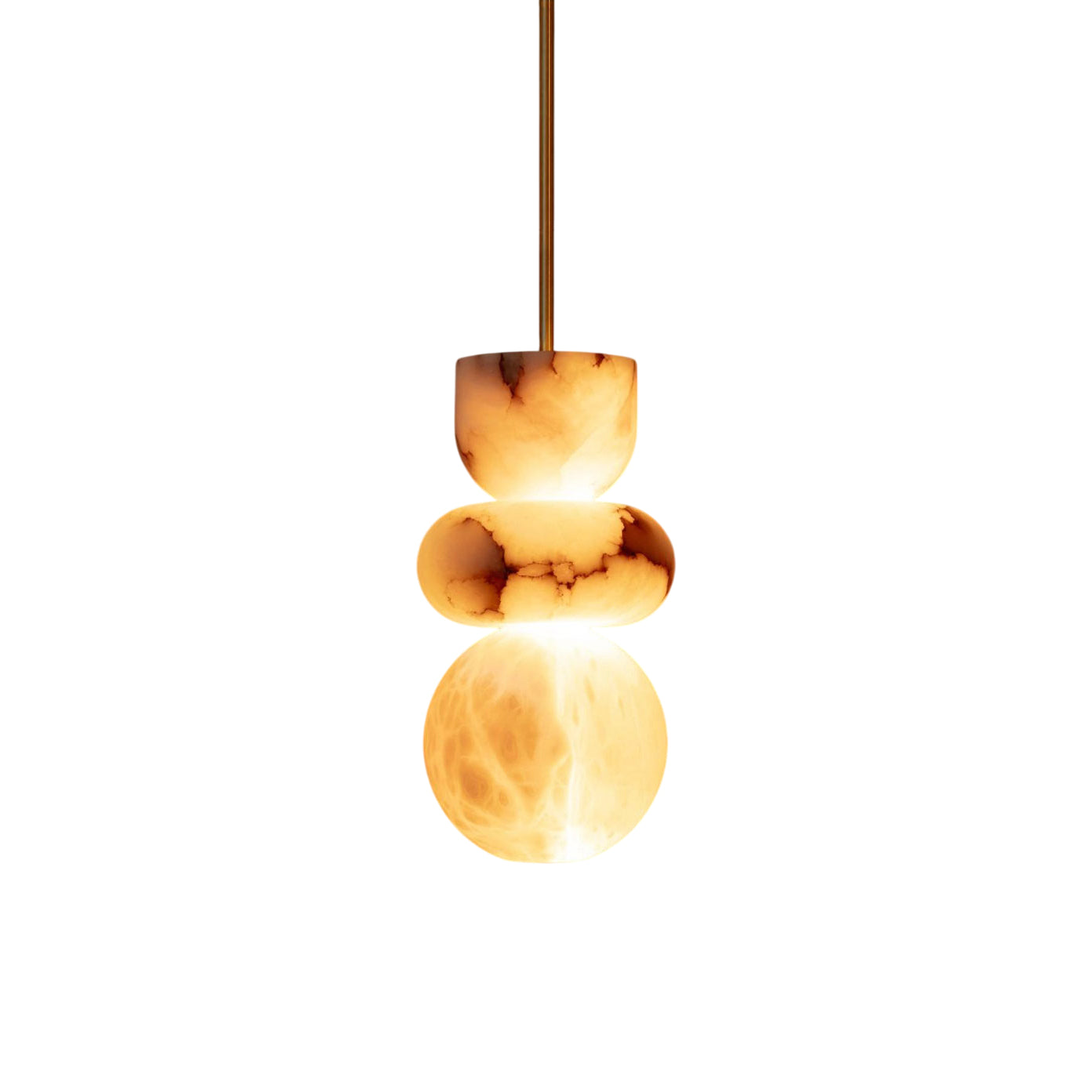 Alabaster totem pendant light lit on a white background, warm glow spilling between each stone section