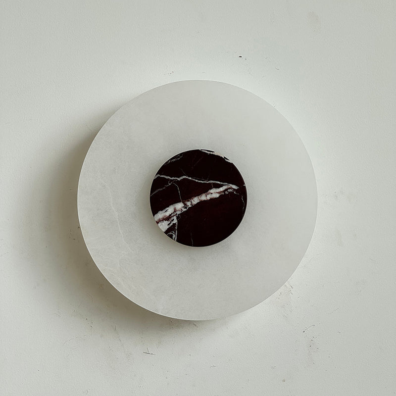 Clérachic unlit Rauduvyi wall lamp mounted flat to the wall, burgundy marble disc centred on pale alabaster