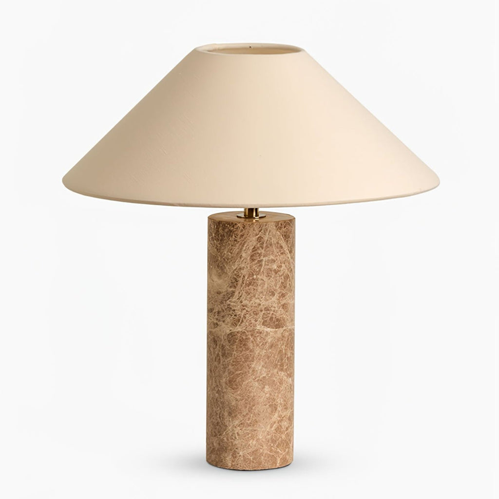 Close-up from a low angle of the Clérachic table lamp's shade underside, shown unlit and pale ivory.