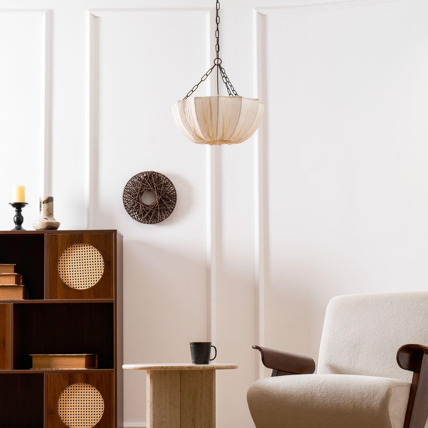 Cotton pendant light with black frame in a bright interior