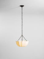 Gathered cotton pendant light with warm glow and black chain