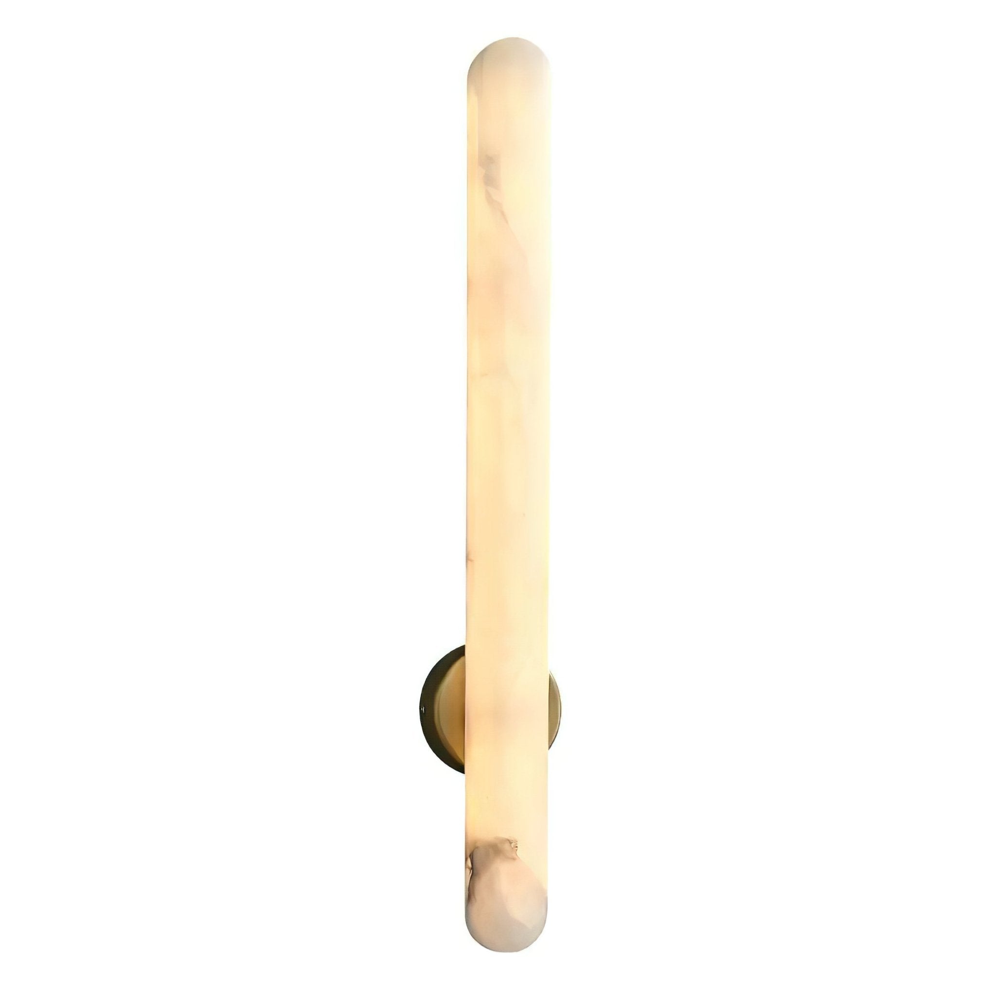 The taller sconce unlit on white, its brass mount visible against the pale alabaster.