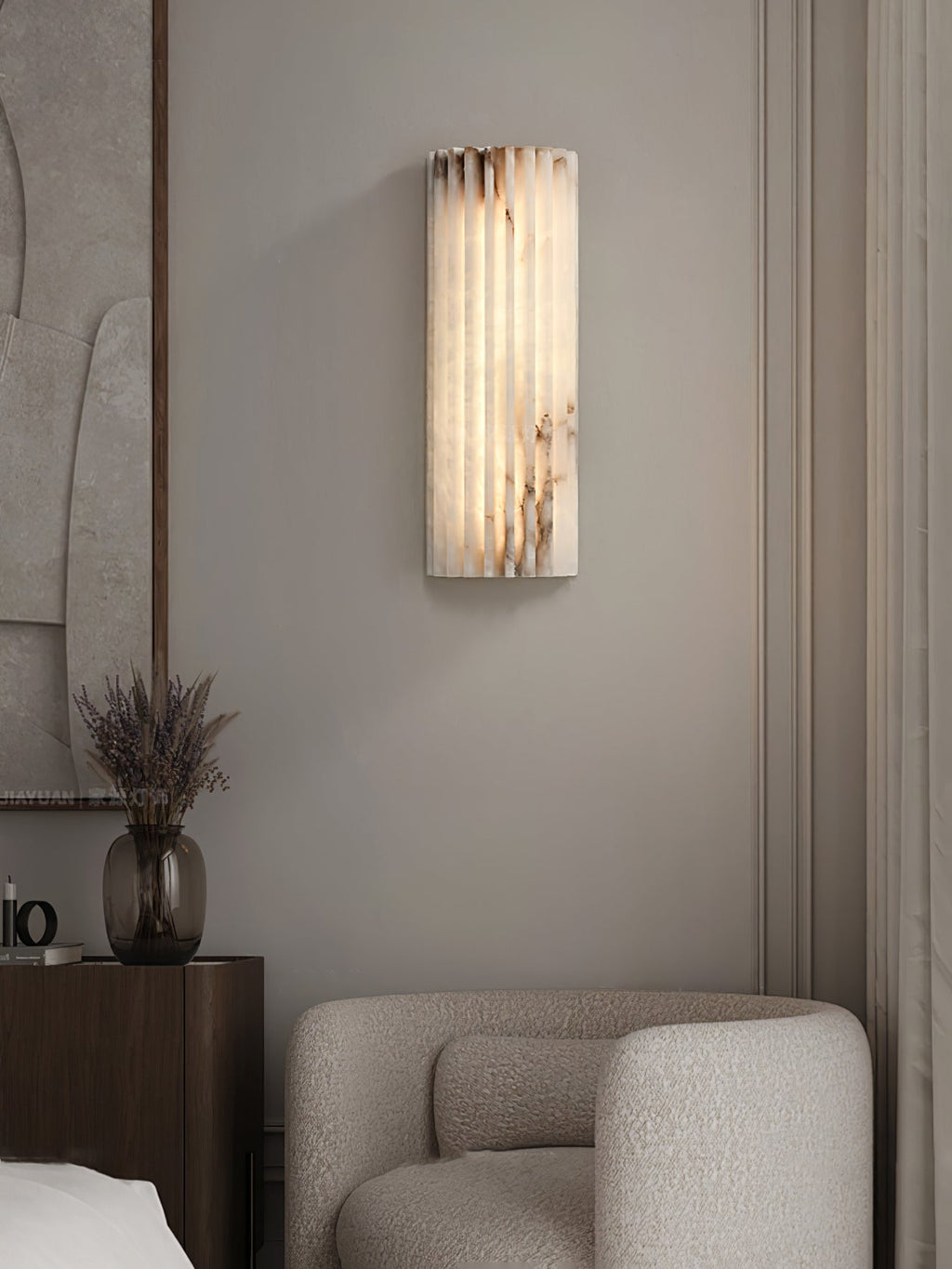 Alabaster wall light shown at an angle revealing its depth