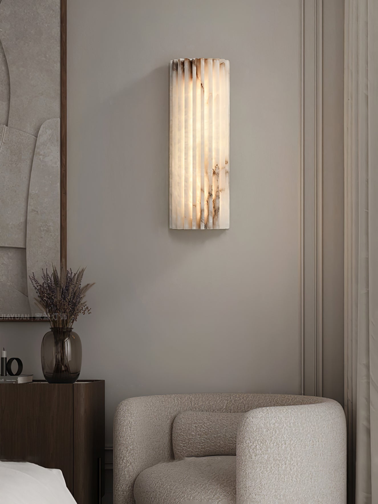 Alabaster wall light shown at an angle revealing its depth
