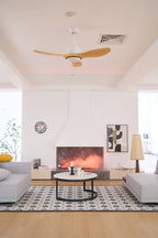 Ceiling fan with walnut blades viewed from the floor