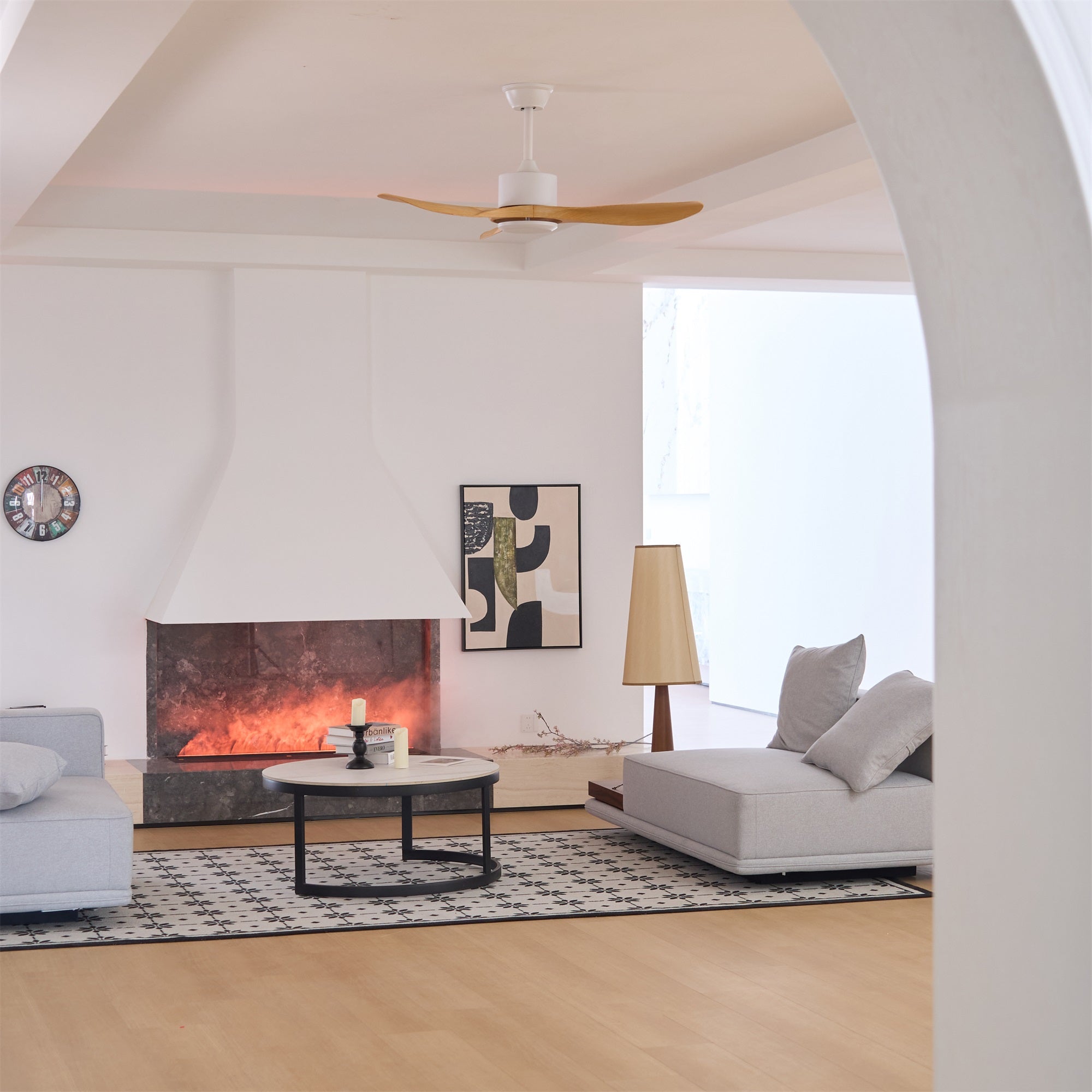 Curved-blade ceiling fan in a contemporary bedroom