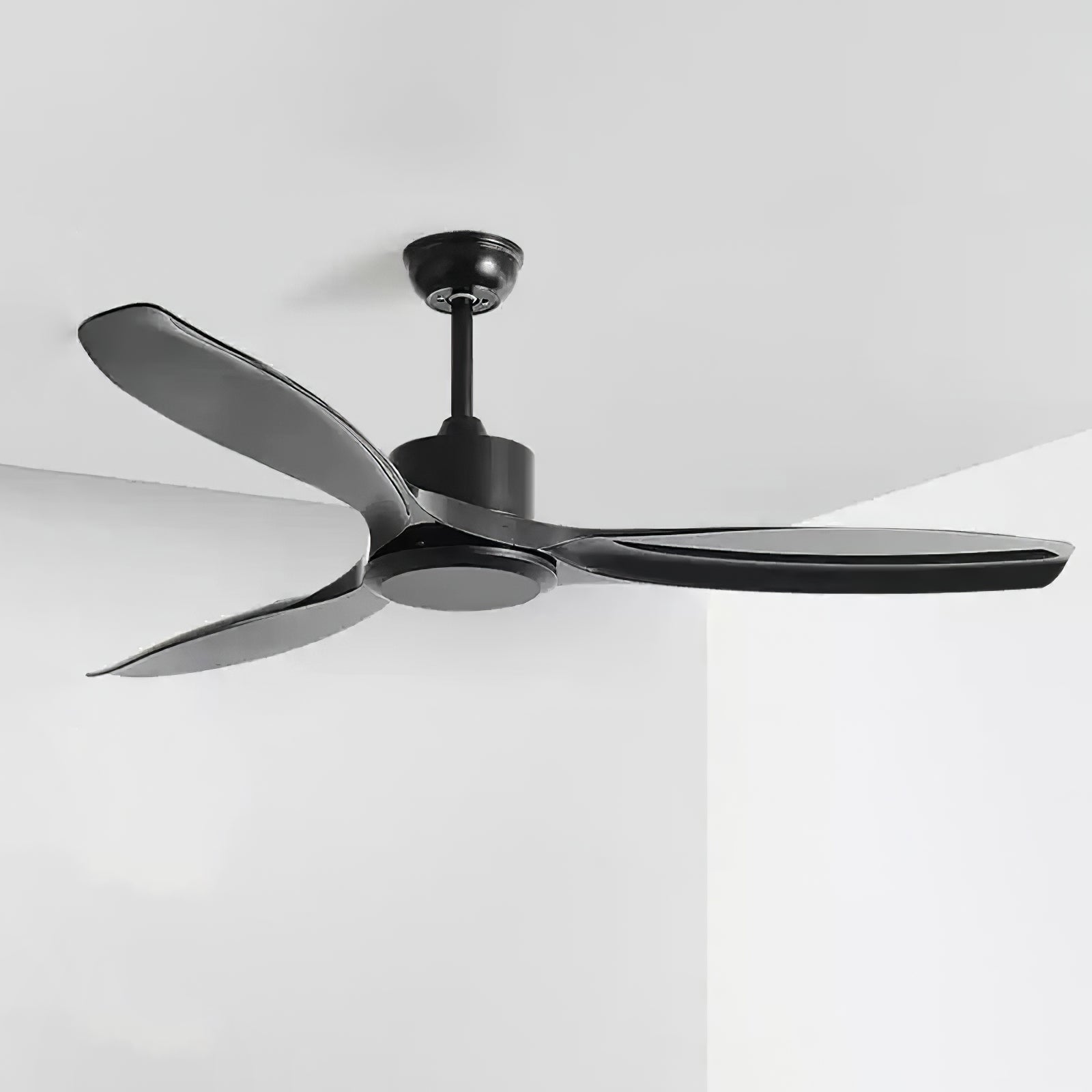 Ceiling fan with walnut wood grain blades above a sofa