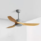Ceiling fan with sculpted blades shown in a styled interior