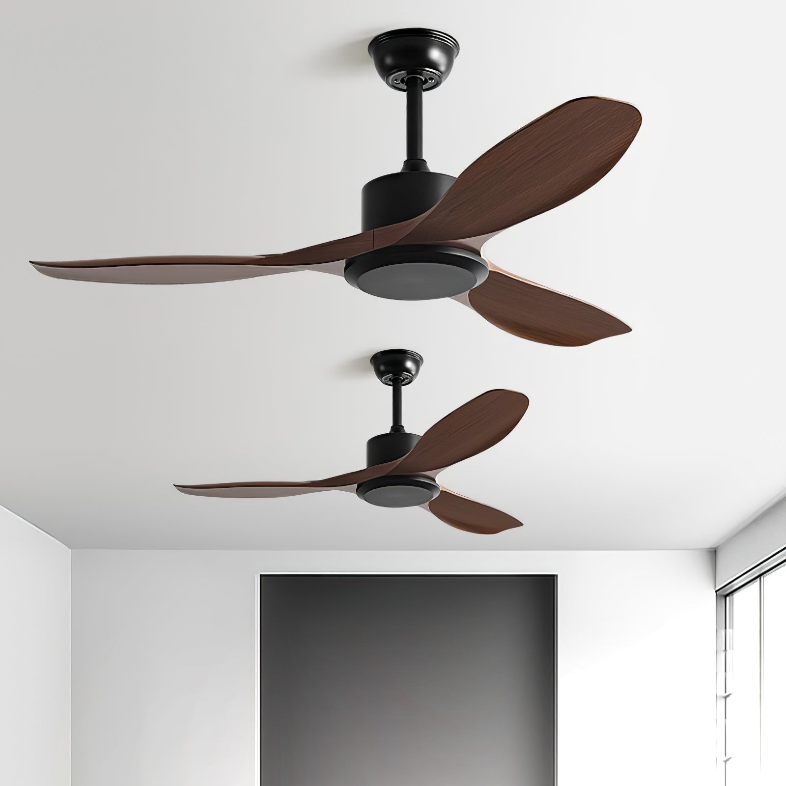 Curved-blade ceiling fan installed above a dining table
