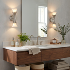 Flanking a rectangular mirror over a floating walnut vanity, these Clérachic sconces in brushed nickel light the towels below.