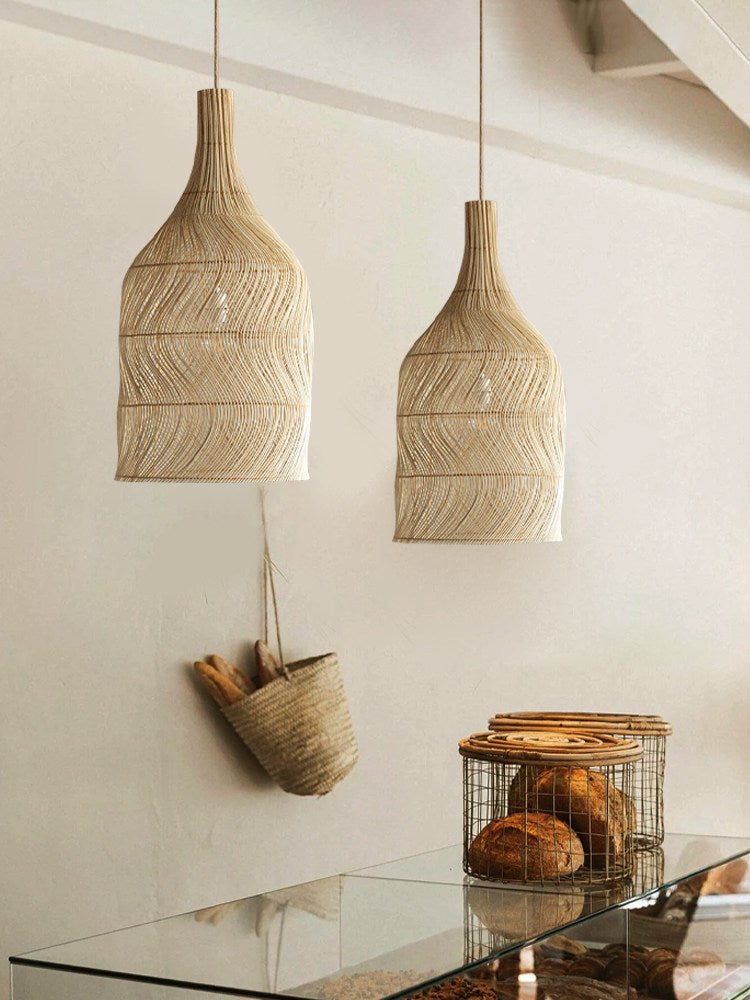 A second view shows two of this Clérachic pendant hanging above the same bakery counter and woven basket.