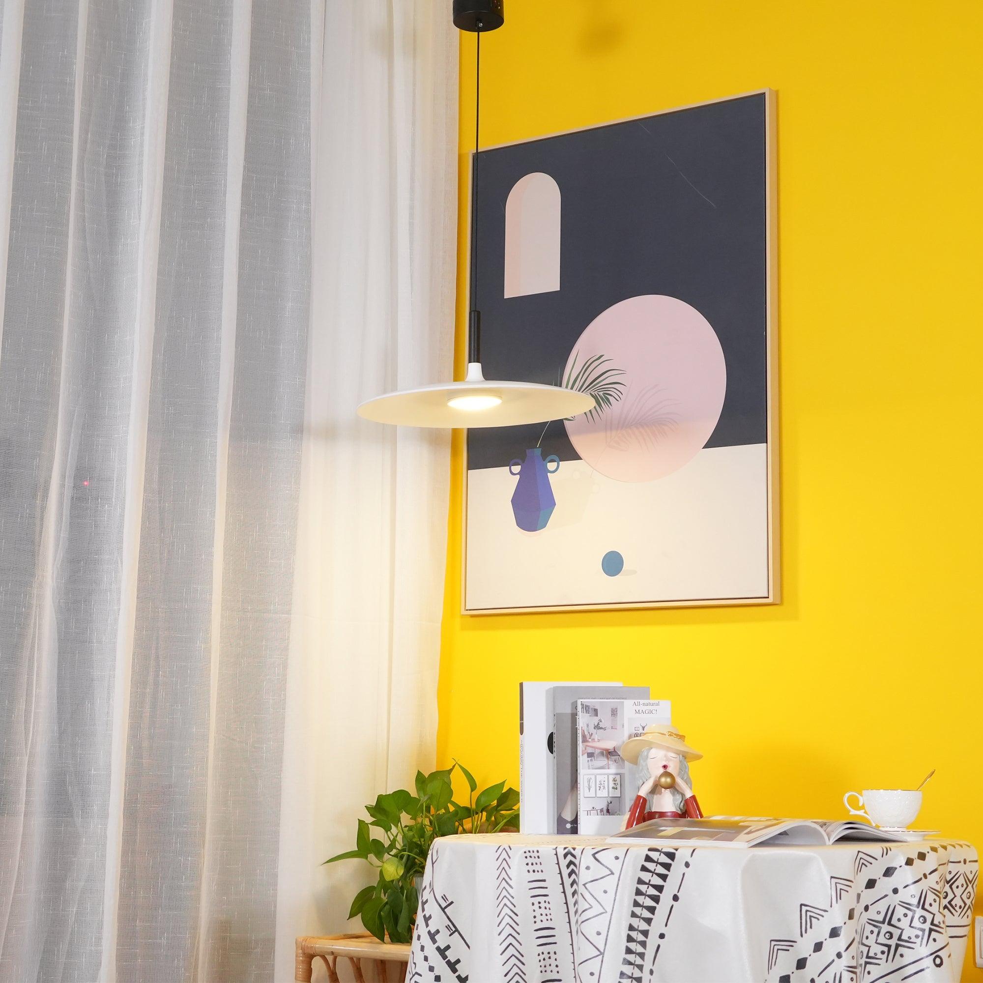 Pendant light with aluminum shade detail and warm glow