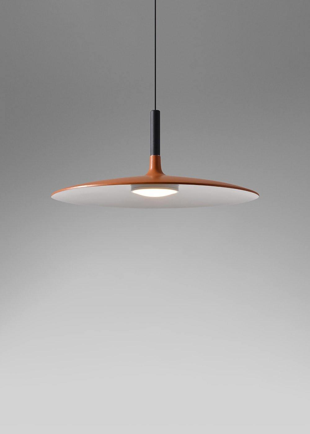 Aluminum pendant light shade viewed in a styled interior