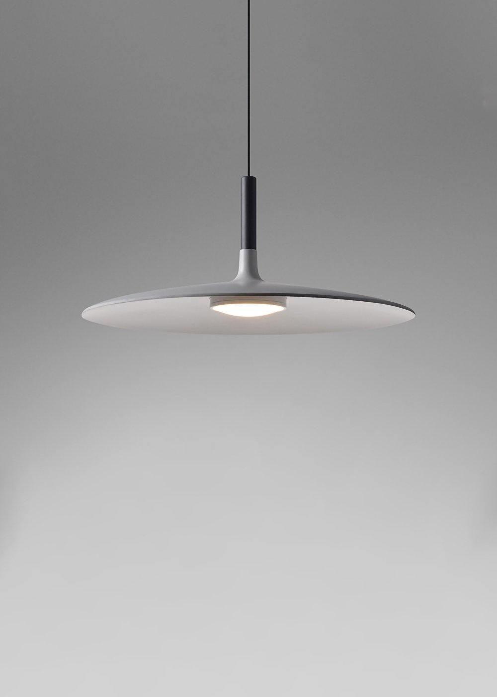 Aluminum pendant light shade viewed against a soft backdrop