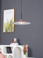 Aluminum pendant light shown suspended over a tabletop