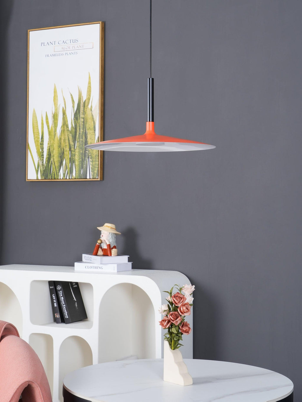 Pendant light with aluminum shade in a bright modern room