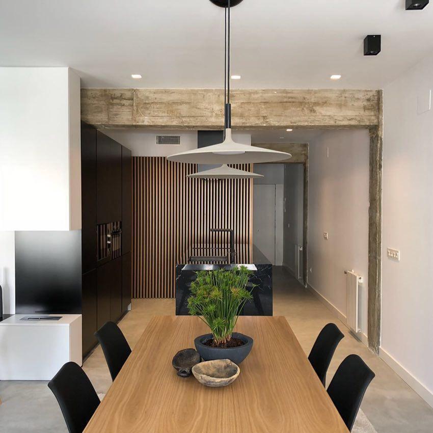 Aluminum pendant light grouped as a layered installation