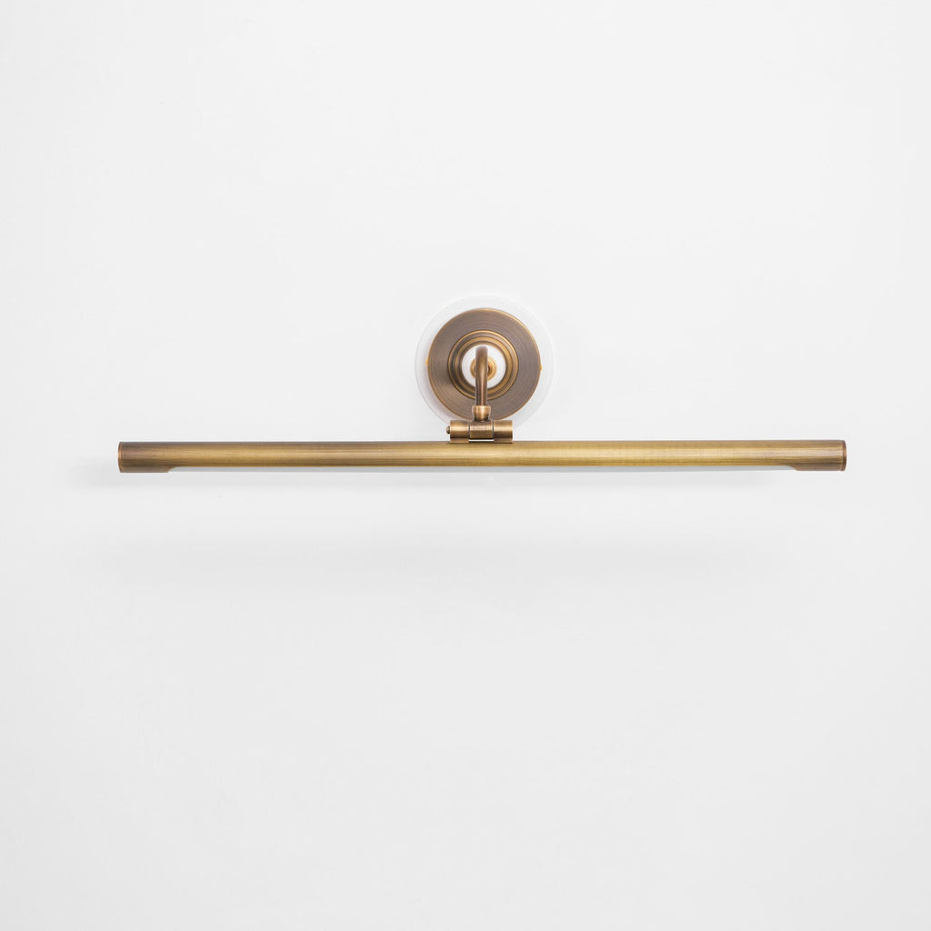 This Clérachic wall sconce in bronze sits unlit and straight-on against a plain white background.