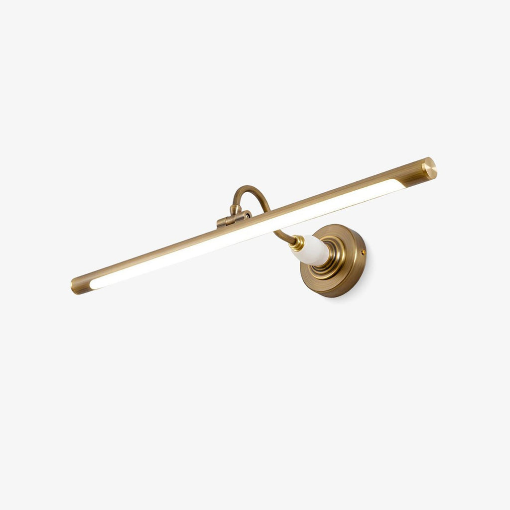 Shown at an angle on a white background, this Clérachic wall sconce in gold reveals its slim bar and acrylic shade.