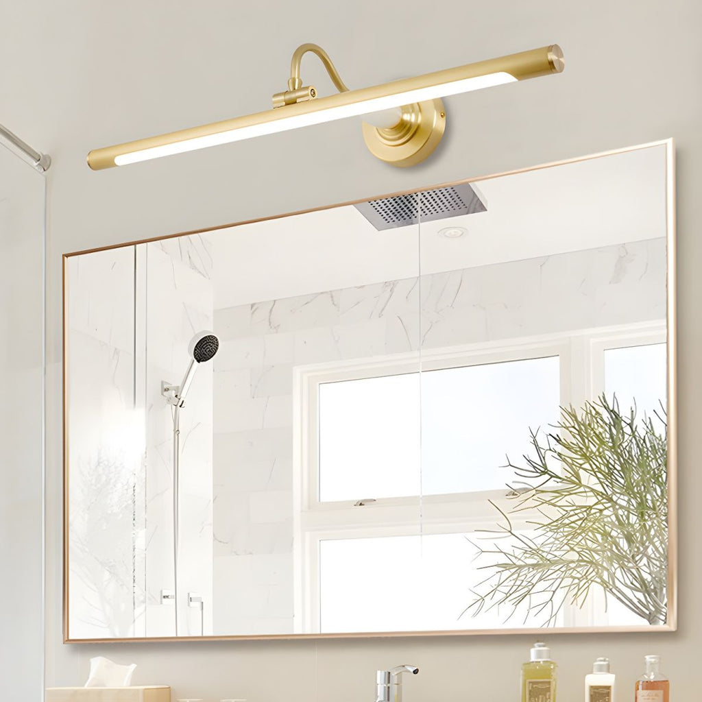This Clérachic wall sconce in gold mounts above a large mirror in a bathroom, its acrylic shade unlit.