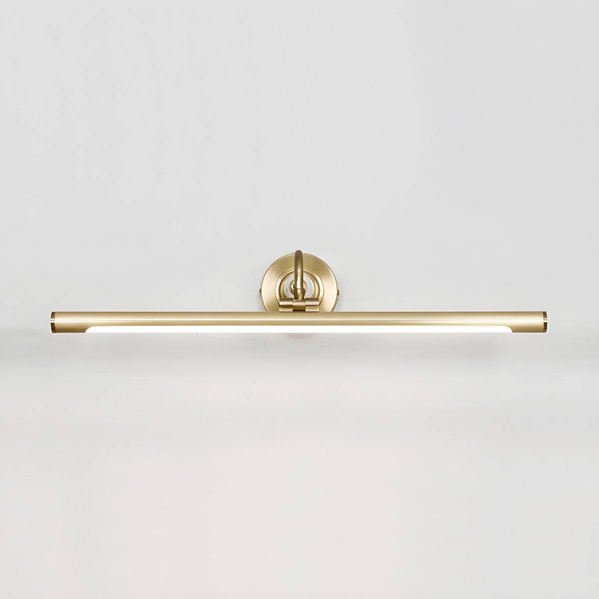 Viewed straight on and unlit, this Clérachic wall sconce in gold shows its full bar length and mounting bracket.