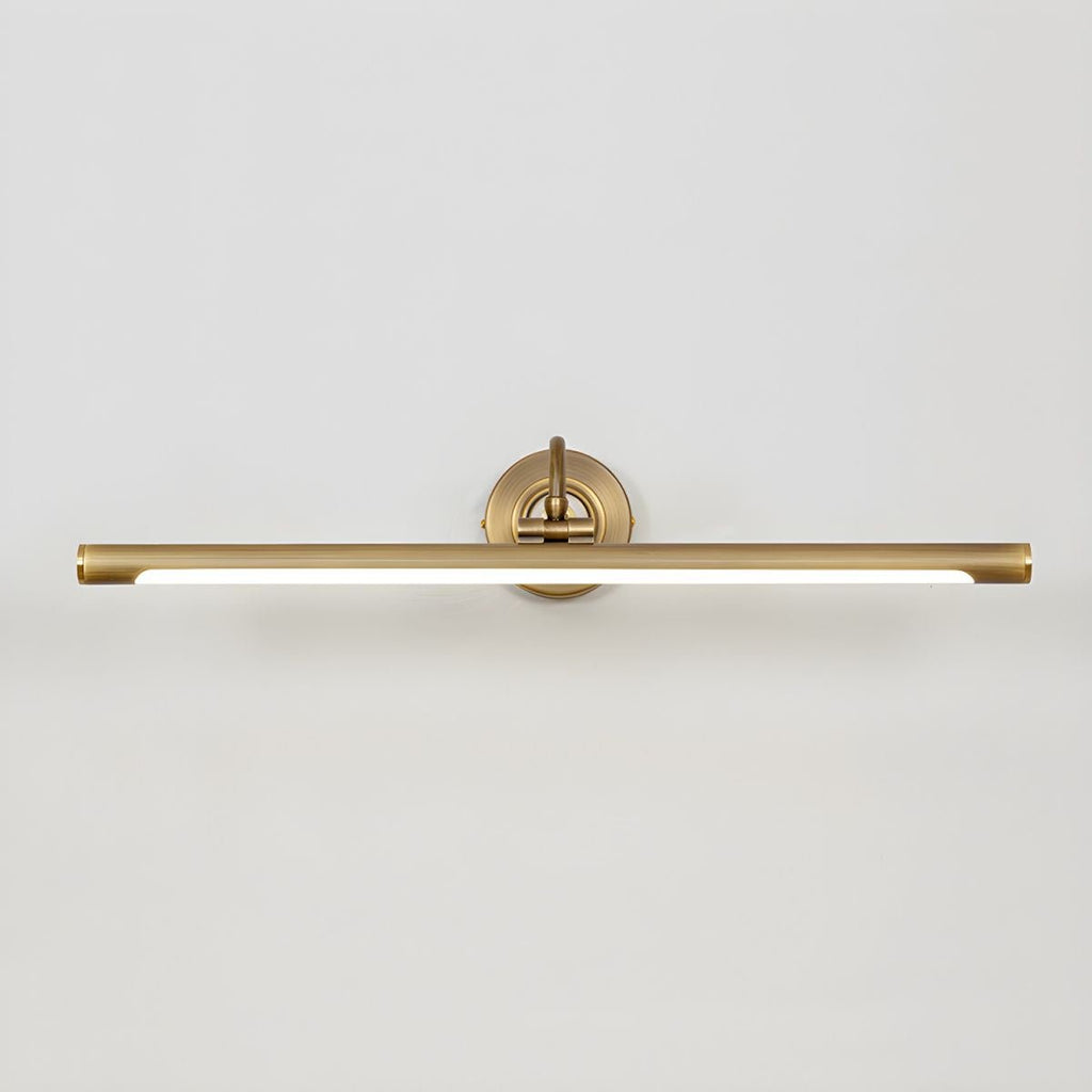 This Clérachic wall sconce in gold glows along its full bar length, viewed straight on against a plain background.