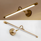 Shown lit on a warm background and unlit on white, this Clérachic wall sconce in gold is pictured from the same angle twice.