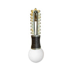 Clérachic wall light with cream stone beads on a brass frame and a dark bronze-wrapped base, photographed straight-on against white.